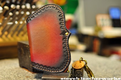 red sunburst fin wallet.front